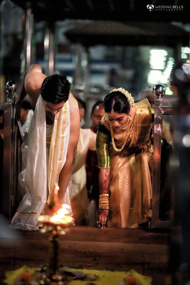 Couple praying at temple